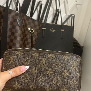 Louis Vuitton, authentic, Brown Monogram Wallet with Iconic Design